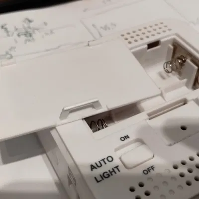 Nắp đậy pin cho đồng hồ báo thức FanJu FJ3533