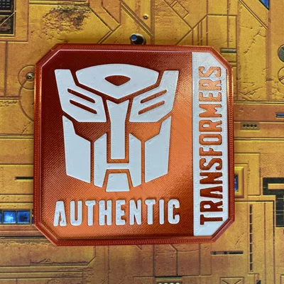 Đế ly Transformers với logo "Authentic" độc đáo