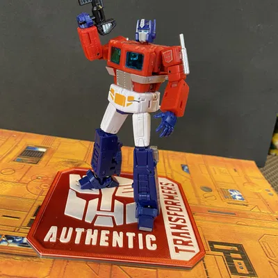 Đế ly Transformers với logo "Authentic" độc đáo