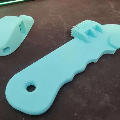 Công cụ chăm sóc cây trồng hình dạng giày đá bóng