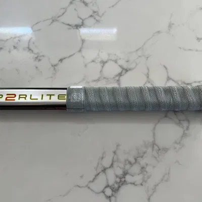 Nắp đầu gậy khúc côn cầu có núm điều chỉnh tham số