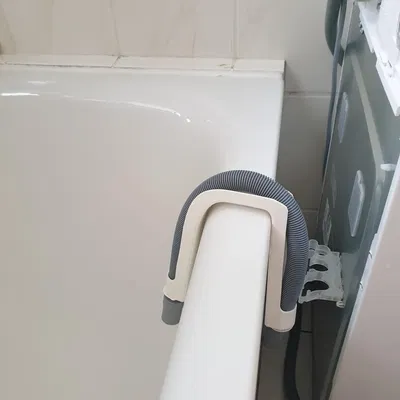 Giá đỡ ống thoát nước máy giặt cho bồn tắm