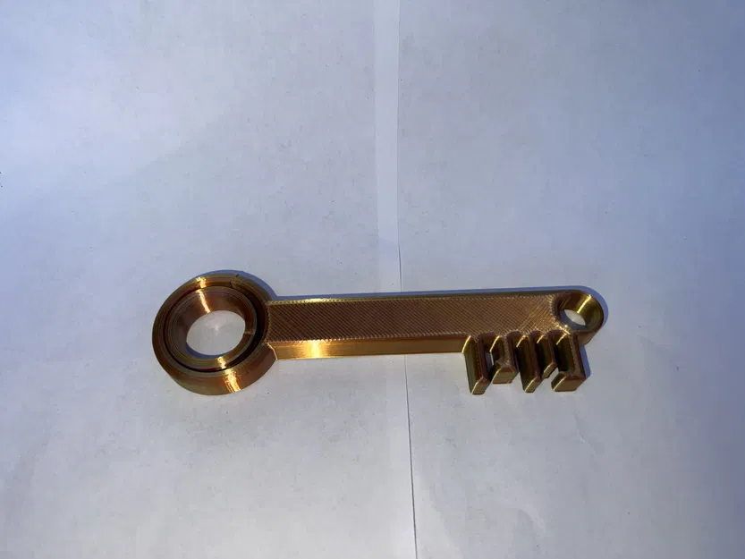 Móc chìa khóa Karamkey với thiết kế xoay độc đáo - Image 1