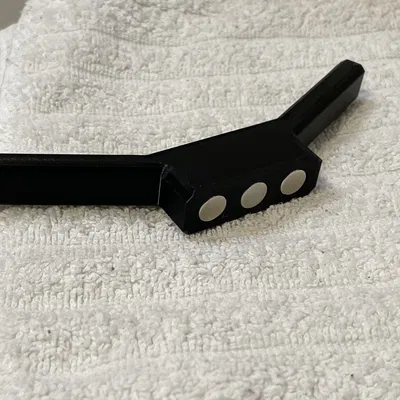 Móc treo tường có nam châm cho máy duỗi tóc