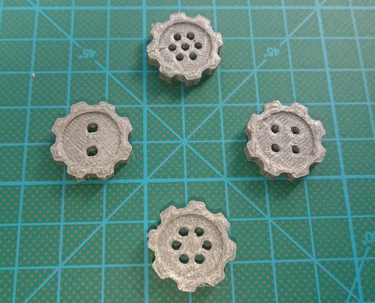 Nút hình bánh răng với nhiều lỗ khác nhau - Image 1