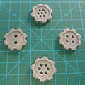 Nút hình bánh răng với nhiều lỗ khác nhau - Thumbnail 1
