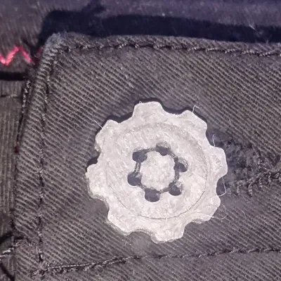 Nút hình bánh răng với nhiều lỗ khác nhau