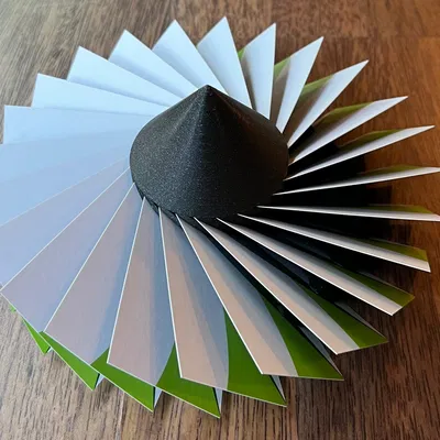 Giá đỡ danh thiếp hình tuabin phản lực xoay