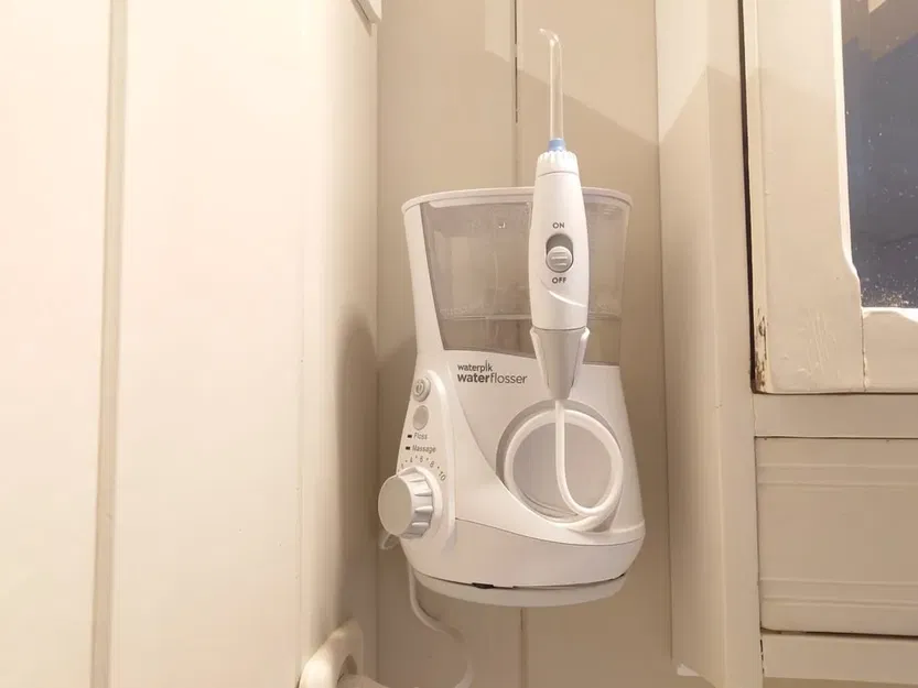 Giá đỡ tường cho máy tăm nước Waterpik WP-660 - Image 1