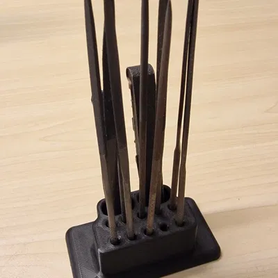 Giá đỡ bàn cho mười cây kim và hai khối chà nhám