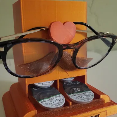 Giá đỡ kính mắt và bộ phân phát kính áp tròng