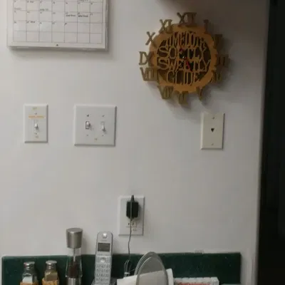 Giá đỡ đồng hồ treo tường thủ công không làm hỏng tường