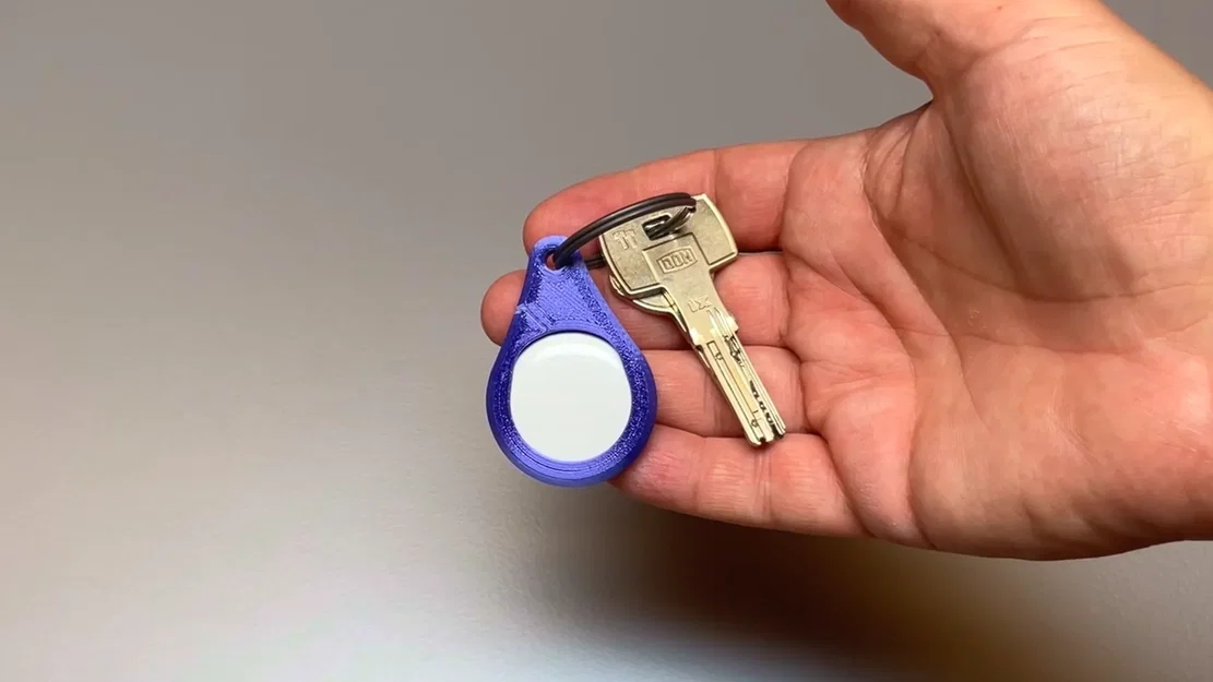 Móc chìa khóa bảo vệ AirTag với cơ chế khóa thông minh - Image 1
