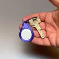 Móc chìa khóa bảo vệ AirTag với cơ chế khóa thông minh - Thumbnail 1