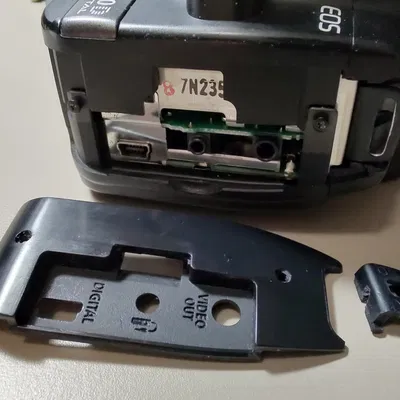 Thay thế nắp cao su kết nối cho Canon EOS 400D