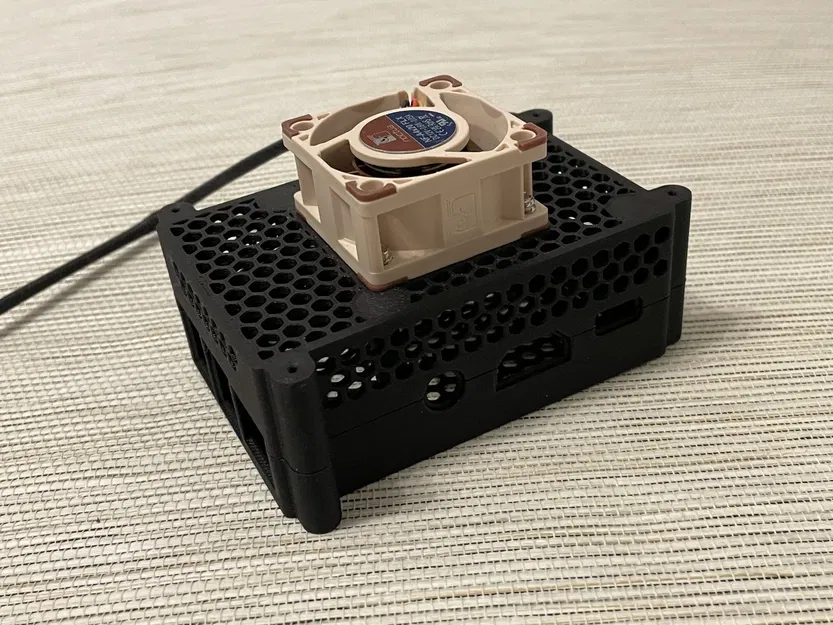 Vỏ máy tính Radxa Rock Pi 4 Plus với quạt 40x40 mm - Image 1