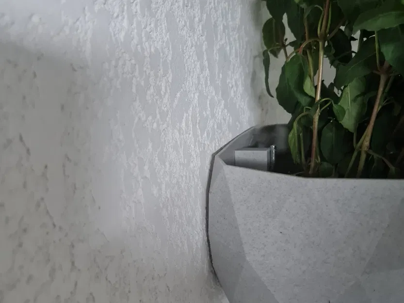 Khối đệm giữ chậu hoa gần tường - Image 1