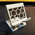 Giá đỡ điện thoại với thiết kế lỗ sạc cải tiến - Thumbnail 1