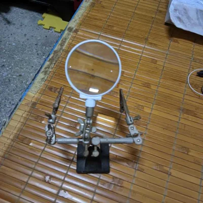 Giá đỡ kính lúp cho việc hàn sửa chữa