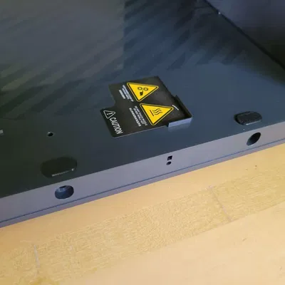 Nắp che lỗ dưới đế máy in P1P