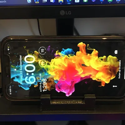 Giá đỡ điện thoại với lỗ khoét cho thanh Home iPhone