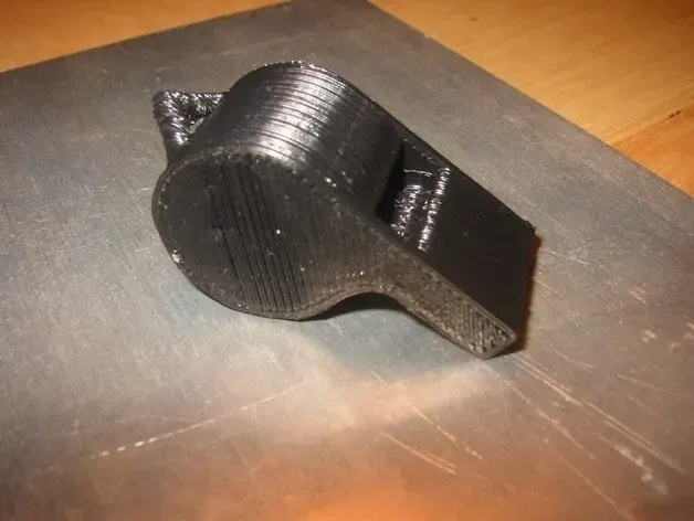 Còi bóng đá cho trọng tài trong trận đấu thể thao - Image 1