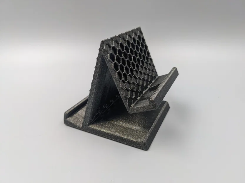 Giá đỡ điện thoại hình lục giác với lỗ sạc - Image 1