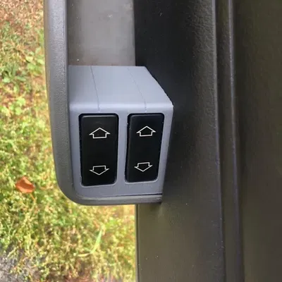 Nắp che công tắc điều chỉnh cửa sổ Peugeot 205