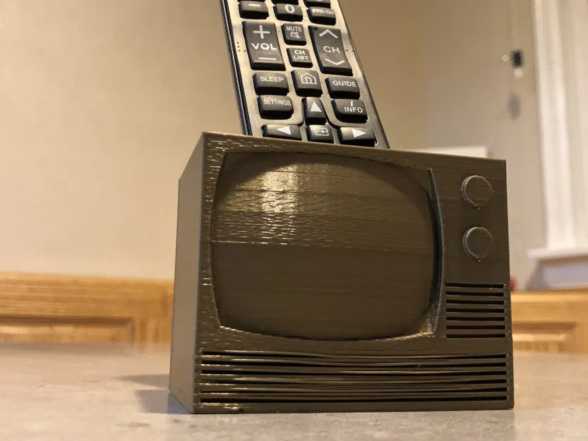 Giá đỡ điều khiển từ xa hình TV độc đáo - Image 1