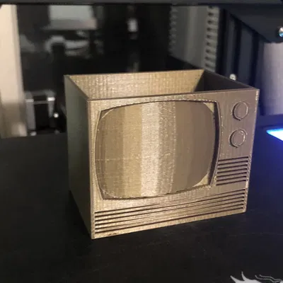 Giá đỡ điều khiển từ xa hình TV độc đáo