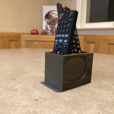 Giá đỡ điều khiển từ xa hình TV độc đáo