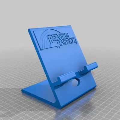 Giá đỡ máy tính bảng với họa tiết cầu vồng đọc sách