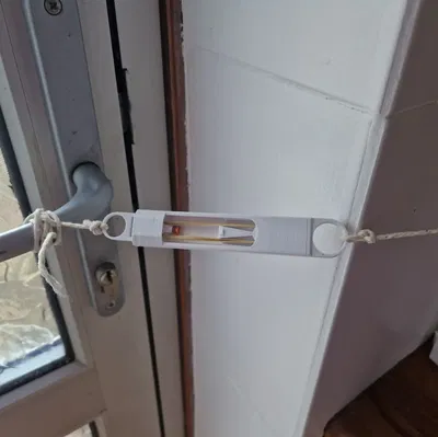 Bẫy dây trip wire sử dụng nắp súng cao su