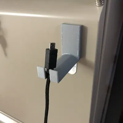 Giá đỡ tai nghe với giá treo cáp USB