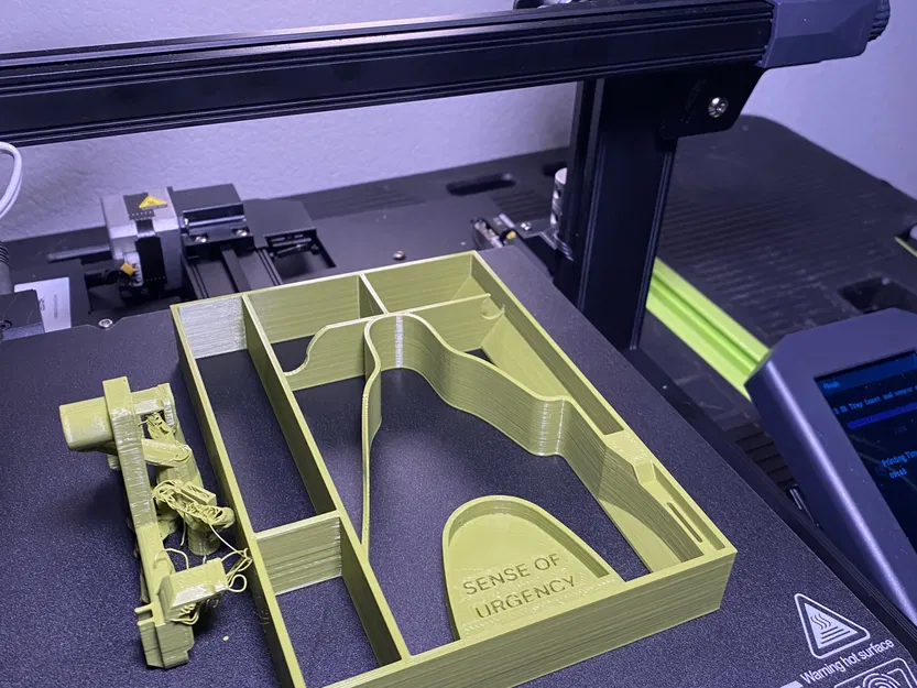 Khay để đồ Ender 3 S1 với chữ “SENSE OF URGENCY” - Image 4