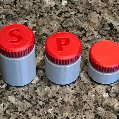 Cụm rắc gia vị ngoài trời cho muối và tiêu