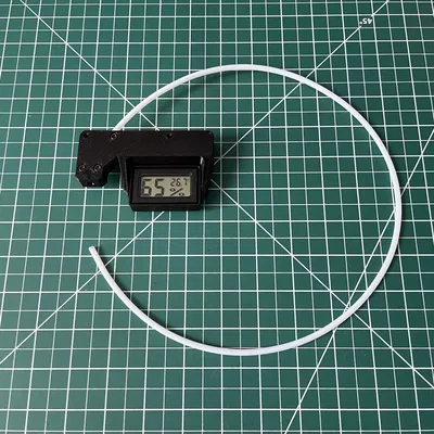 Giá đỡ nhiệt kế điều chỉnh và hướng dẫn filament bên trá...