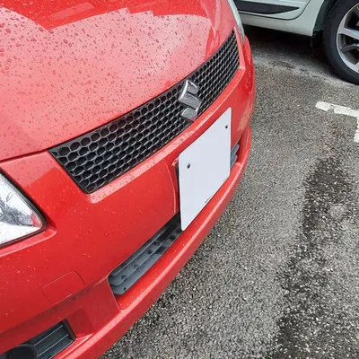 Cái chêm cho biển số xe Suzuki Swift