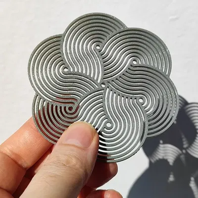 Đế lót ly với họa tiết gạch Truchet 3D