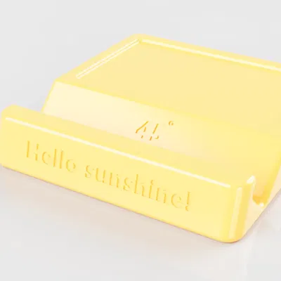 Giá đỡ điện thoại di động tối giản cho việc đọc trên bàn