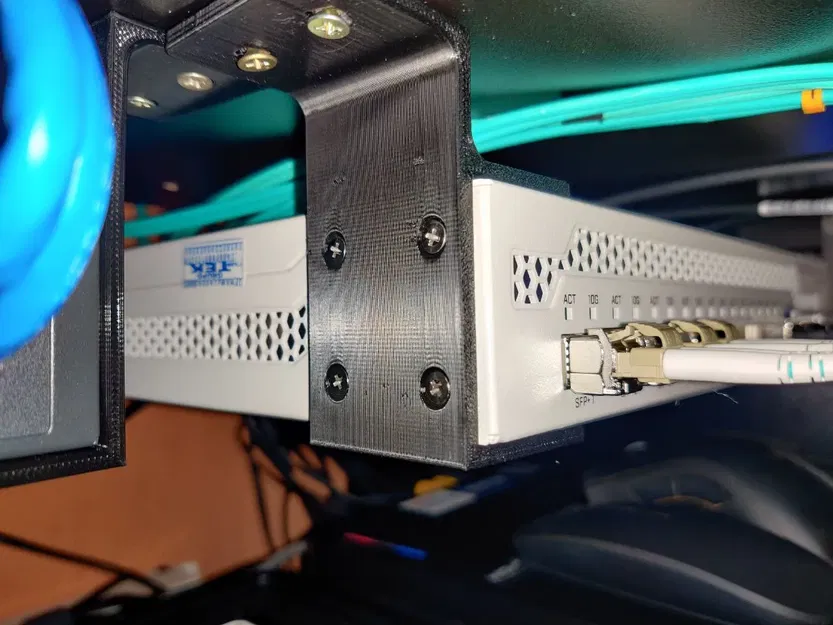 Giá đỡ lắp đặt chuyển mạch Mikrotik CRS309 trên tường hoặc... - Image 1