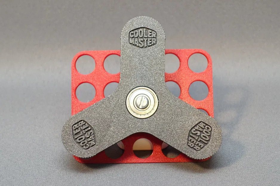 Giá đỡ fidget spinner cho thùng máy tính Qube 500 - Image 1