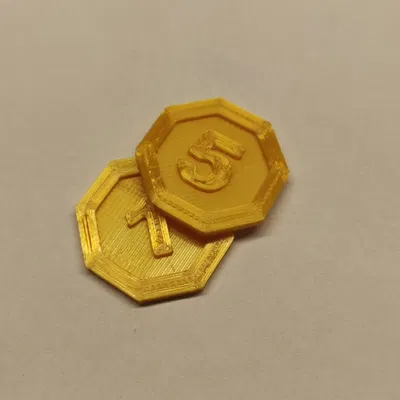 Tiền xu vàng cho trò chơi bàn và thẻ