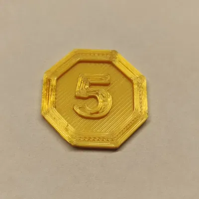 Tiền xu vàng cho trò chơi bàn và thẻ