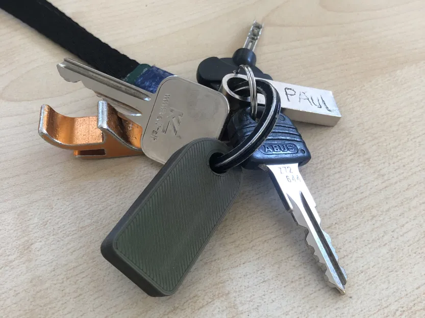 Móc khóa đựng adapter lightning sang aux - Image 2