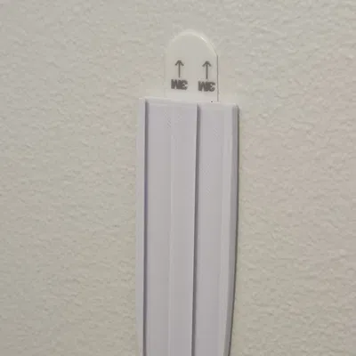 Móc treo tường với tab gỡ bỏ ẩn cho băng dính Command