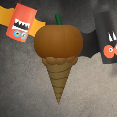 Bánh kem hình bí ngô Halloween trong ốc quế