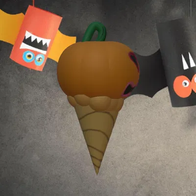 Bánh kem hình bí ngô Halloween trong ốc quế