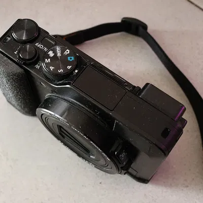 Giá đỡ tripod và tay cầm cho Nikon Coolpix A1000