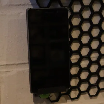 Giá đỡ điện thoại gắn tường tổ ong